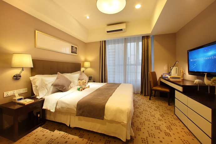 Imagen de la habitación del Hotel Somerset Heping Shenyang. Foto 7