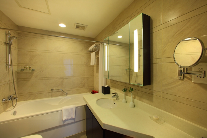 Imagen de la habitación del Hotel Somerset Heping Shenyang. Foto 8