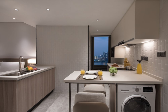 Imagen de la habitación del Hotel Somerset Ioc Hangzhou. Foto 11