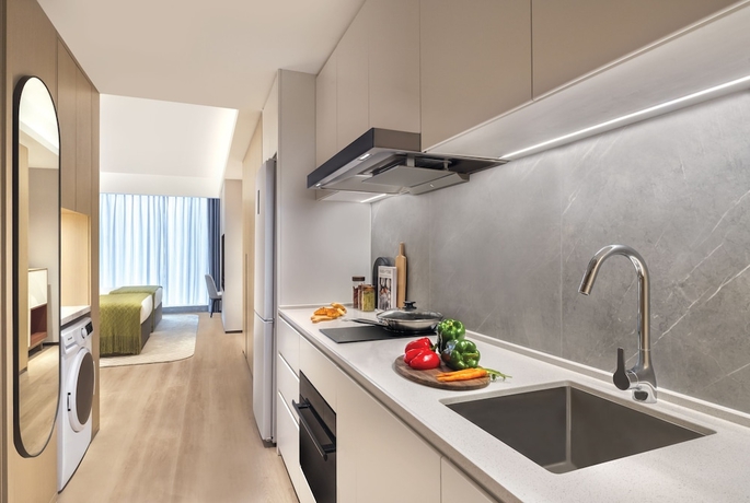 Imagen de la habitación del Hotel Somerset Jimei Xiamen. Foto 7