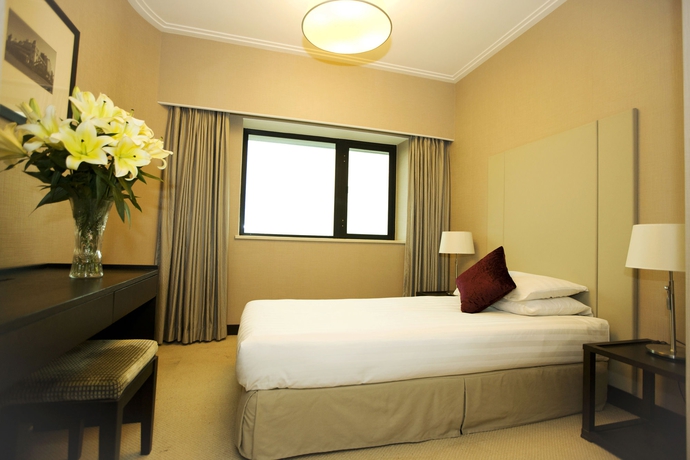 Imagen de la habitación del Hotel Somerset Olympic Tower Tianjin. Foto 3