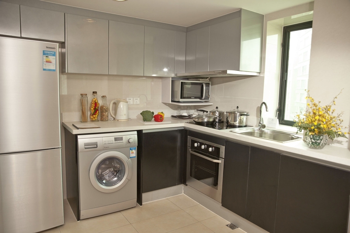 Imagen de la habitación del Hotel Somerset Olympic Tower Tianjin. Foto 6