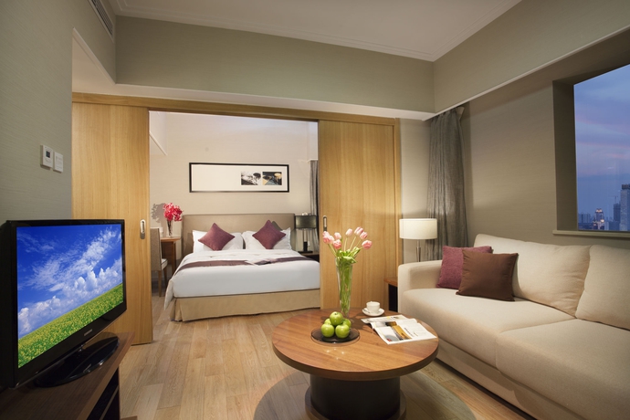 Imagen de la habitación del Hotel Somerset Olympic Tower Tianjin. Foto 7