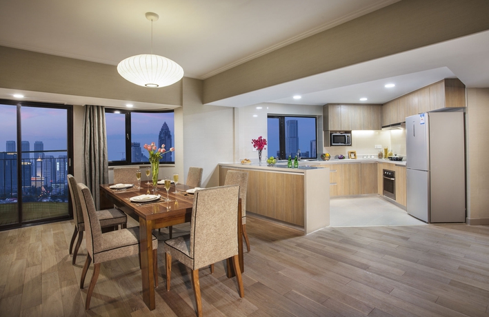 Imagen de la habitación del Hotel Somerset Olympic Tower Tianjin. Foto 9