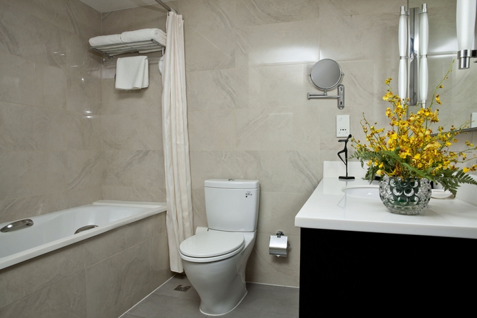 Imagen de la habitación del Hotel Somerset Olympic Tower Tianjin. Foto 11