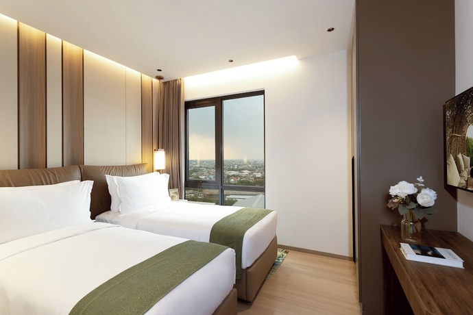 Imagen de la habitación del Hotel Somerset Queen City Semarang. Foto 13