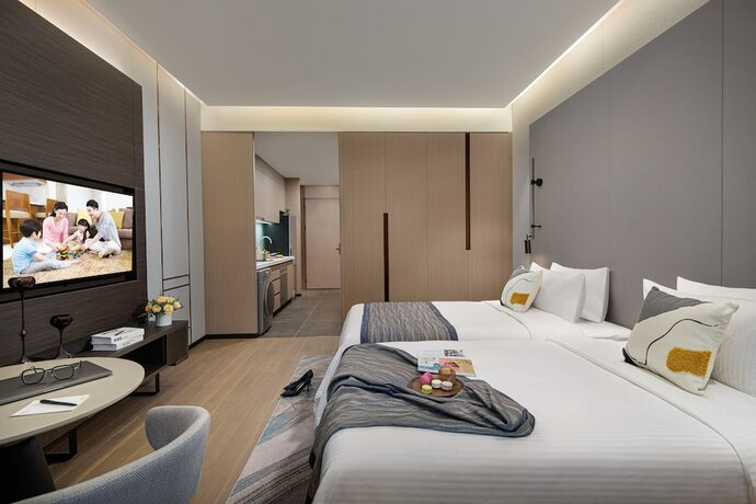 Imagen de la habitación del Hotel Somerset Southbay Zhuhai. Foto 15