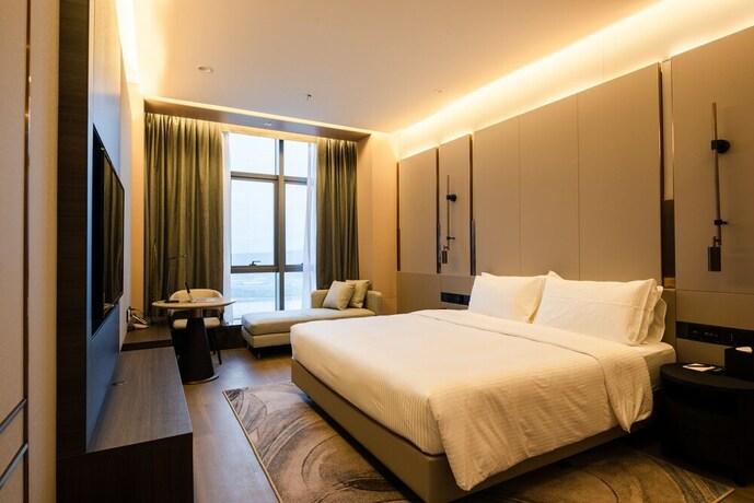 Imagen de la habitación del Hotel Somerset Southbay Zhuhai. Foto 20