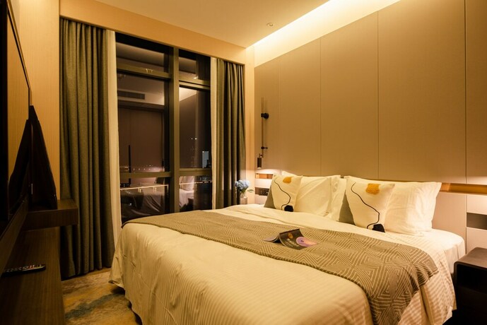 Imagen de la habitación del Hotel Somerset Southbay Zhuhai. Foto 22