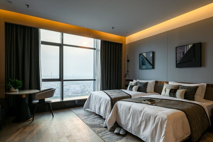 Imagen de la habitación del Hotel Somerset Southbay Zhuhai. Foto 25