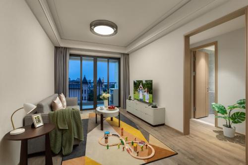 Imagen de la habitación del Hotel Somerset Star River Minhang Shanghai. Foto 13