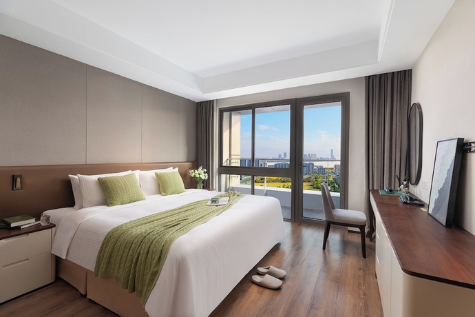 Imagen de la habitación del Hotel Somerset Suzhou Bay Suzhou. Foto 2