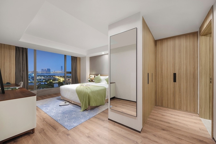 Imagen de la habitación del Hotel Somerset Suzhou Bay Suzhou. Foto 11