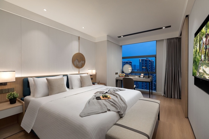 Imagen de la habitación del Hotel Somerset Taihu New City Cbd Wuxi. Foto 11