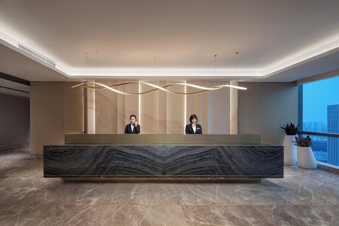 Imagen del bar/restaurante del Hotel Somerset Taihu New City Cbd Wuxi. Foto 2