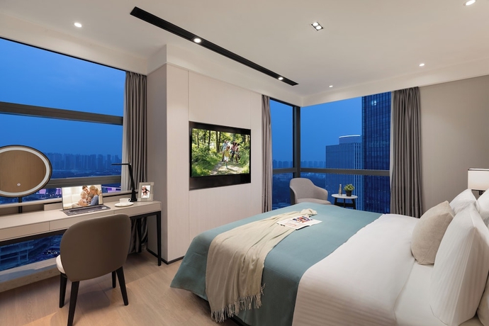 Imagen de la habitación del Hotel Somerset Taihu New City Cbd Wuxi. Foto 13