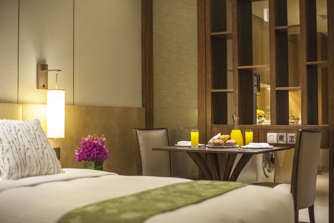 Imagen de la habitación del Hotel Somerset Wusheng Wuhan. Foto 13