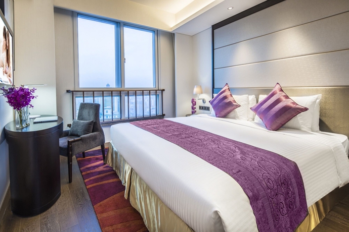 Imagen de la habitación del Hotel Somerset Xu Hui. Foto 6