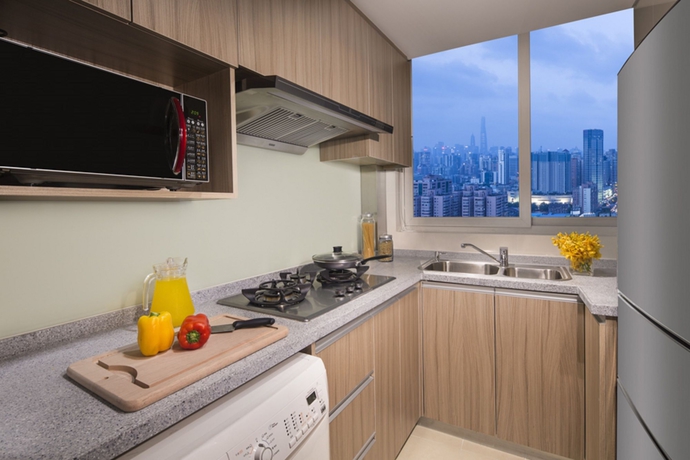 Imagen de la habitación del Hotel Somerset Xu Hui. Foto 10