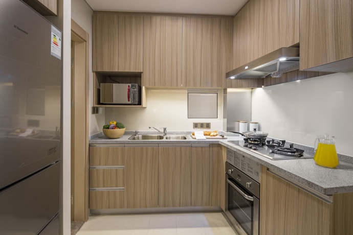 Imagen de la habitación del Hotel Somerset Xu Hui. Foto 11