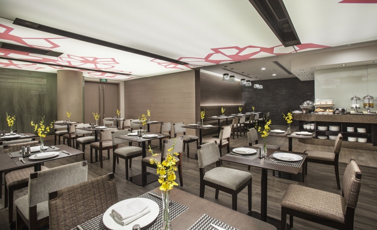 Imagen del bar/restaurante del Hotel Somerset Xu Hui. Foto 2