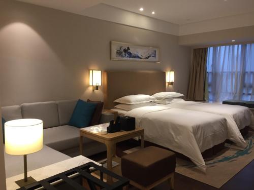 Imagen de la habitación del Hotel Somerset Yangtze River Chongqing. Foto 7