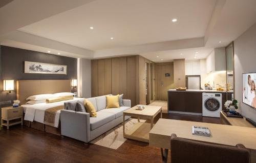 Imagen de la habitación del Hotel Somerset Yangtze River Chongqing. Foto 8