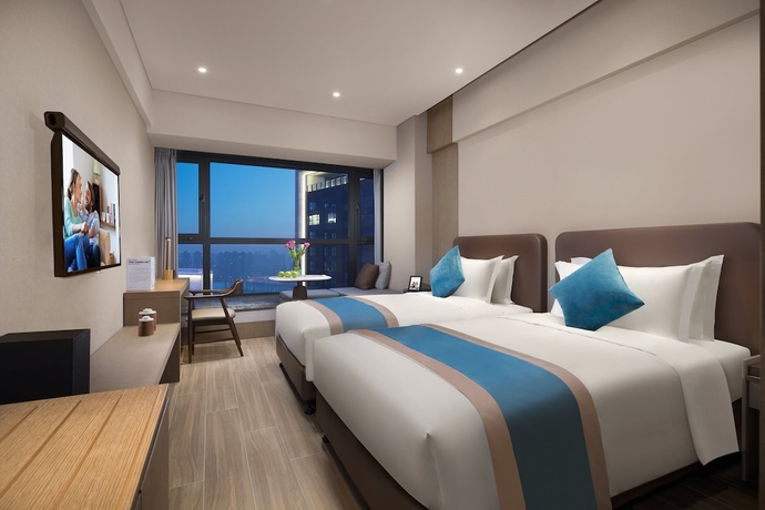 Imagen de la habitación del Hotel Somerset Zhongmao Changchun. Foto 8