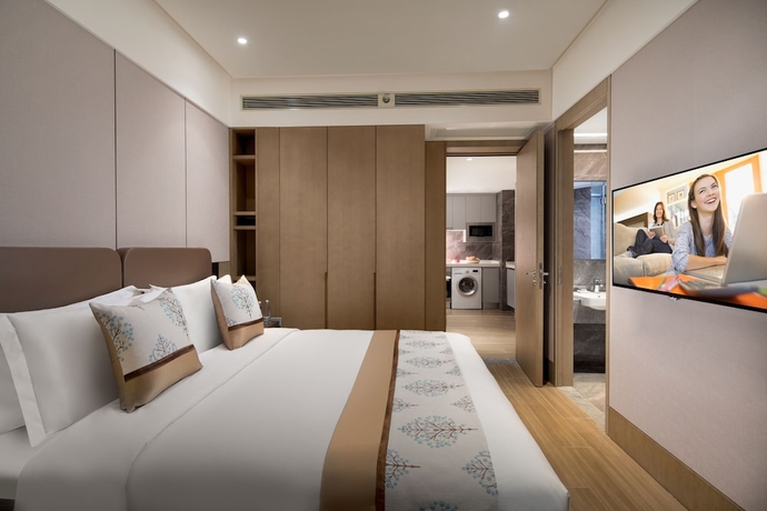 Imagen de la habitación del Hotel Somerset Zhongmao Changchun. Foto 11