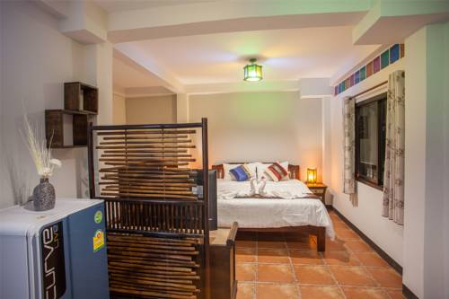Imagen de la habitación del Hotel Somwang Boutique House, Chiang Mai. Foto 13
