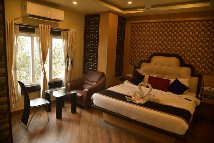 Imagen de la habitación del Hotel Sonar Tori Agartala. Foto 11