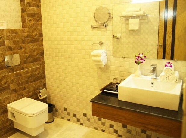 Imagen de la habitación del Hotel Sonar Tori Agartala. Foto 15