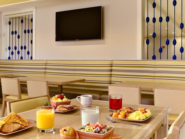 Imagen del bar/restaurante del Hotel Sonesta Es Suites Orlando - International Drive. Foto 3