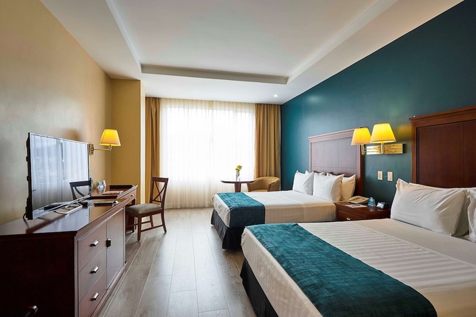 Imagen de la habitación del Hotel Sonesta Loja. Foto 4