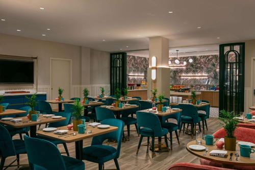 Imagen del bar/restaurante del Hotel Sonesta Miami Airport. Foto 11