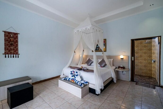 Imagen de la habitación del Hotel Song Bintang Villas. Foto 21