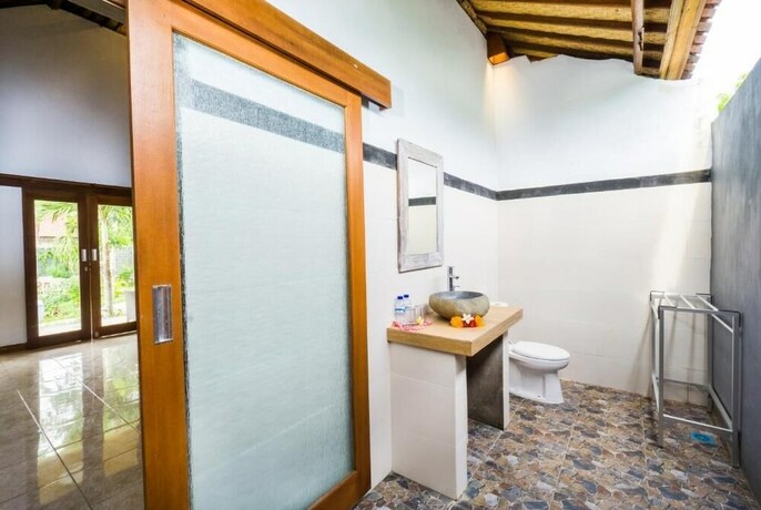 Imagen de la habitación del Hotel Song Bintang Villas. Foto 22