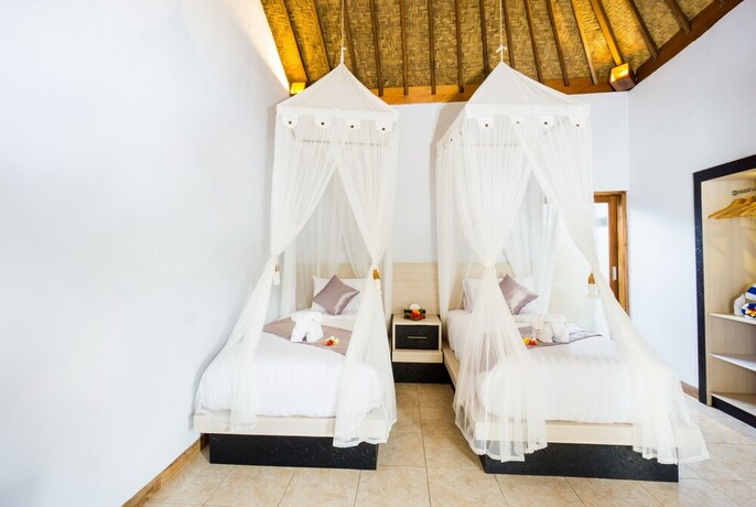 Imagen de la habitación del Hotel Song Bintang Villas. Foto 27