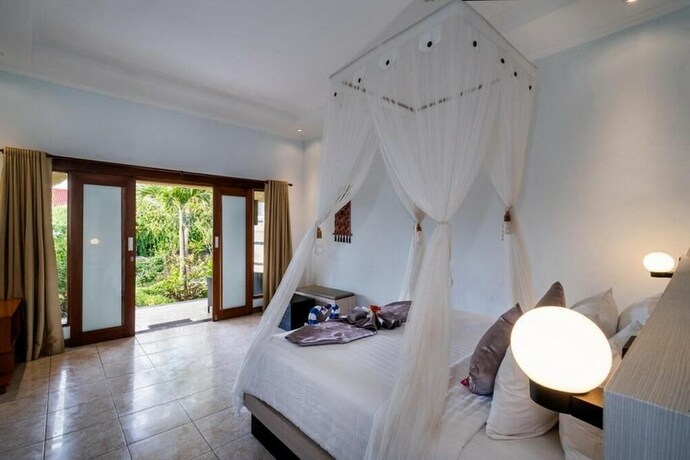 Imagen de la habitación del Hotel Song Bintang Villas. Foto 28