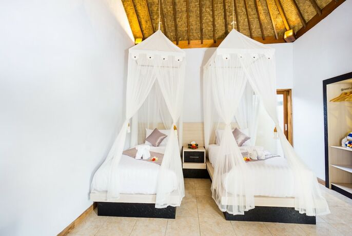 Imagen de la habitación del Hotel Song Bintang Villas. Foto 30