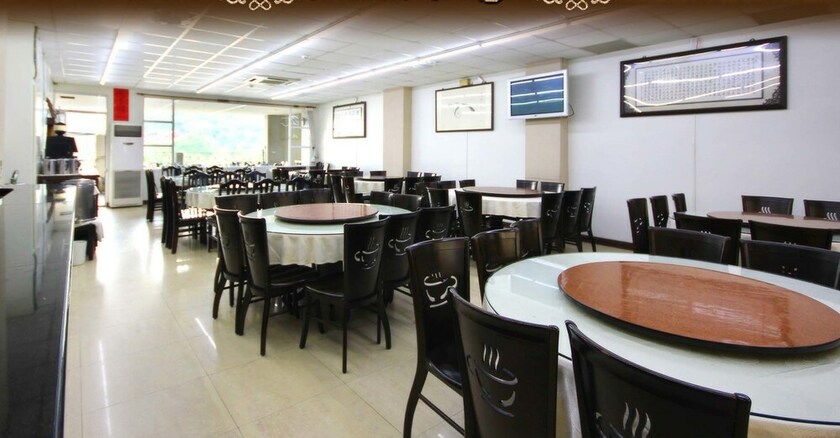 Imagen del bar/restaurante del Hotel Song He Homestay. Foto 17