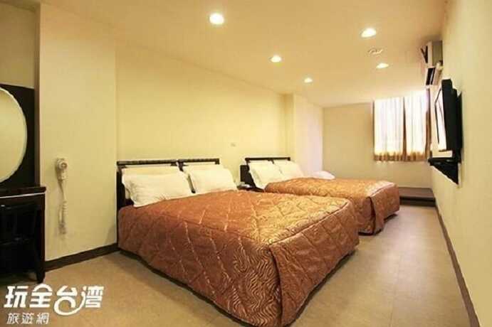 Imagen de la habitación del Hotel Song He Homestay. Foto 18