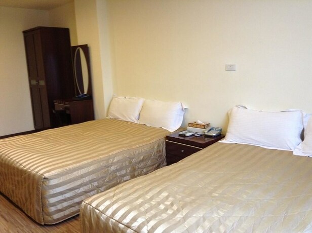 Imagen de la habitación del Hotel Song He Homestay. Foto 19