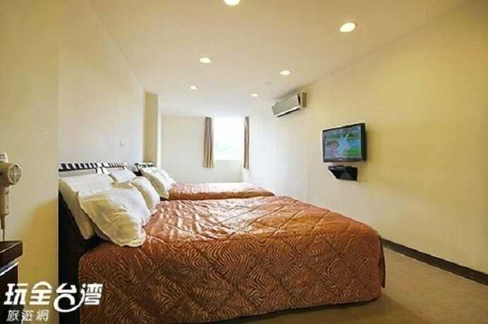 Imagen de la habitación del Hotel Song He Homestay. Foto 20