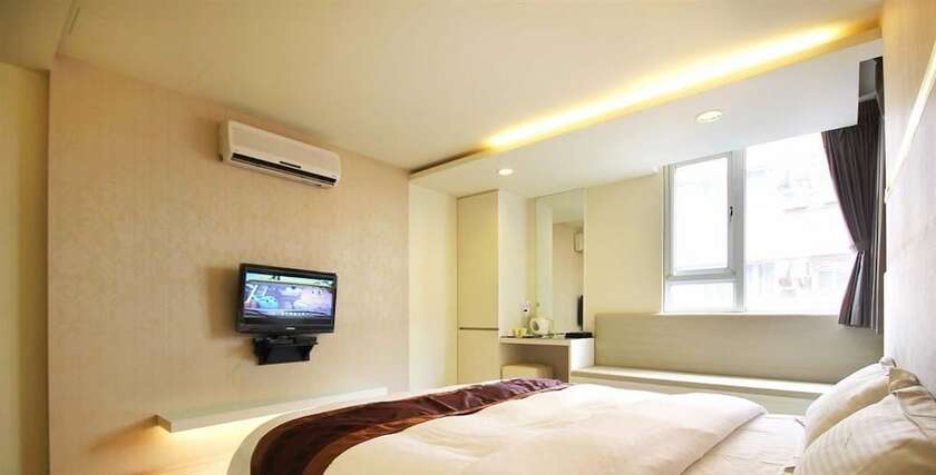 Imagen de la habitación del Hotel Song He Homestay. Foto 23