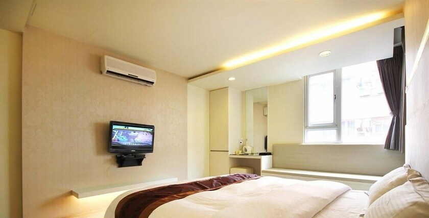 Imagen de la habitación del Hotel Song He Homestay. Foto 25