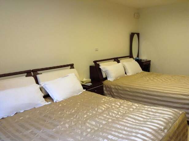 Imagen de la habitación del Hotel Song He Homestay. Foto 28