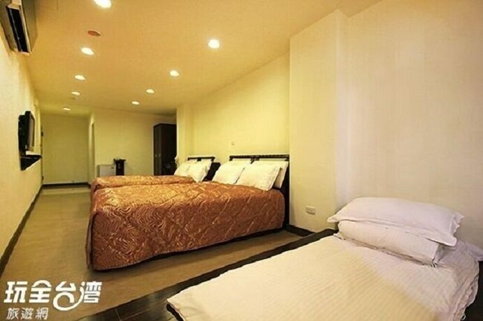 Imagen de la habitación del Hotel Song He Homestay. Foto 33