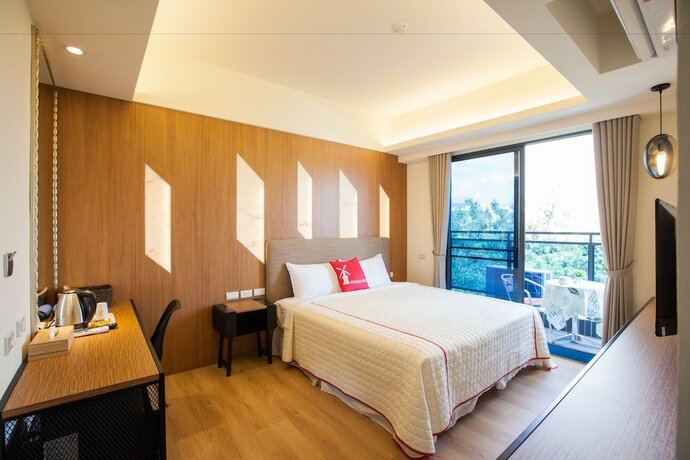 Imagen de la habitación del Hotel Song Ping Resort. Foto 23