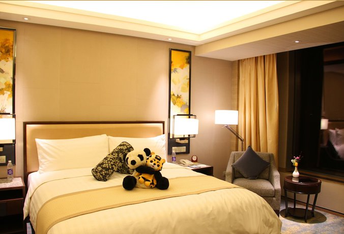 Imagen de la habitación del Hotel Songbei Shangri-La Harbin. Foto 5